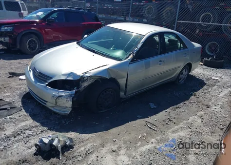 2003 Toyota Camry Le z USA, uszkodzony, nr VIN 4T1BE32K43U767501
